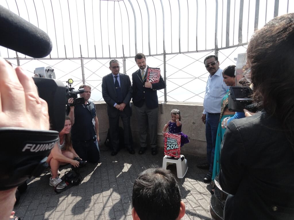 Mr. Dinesh Govindani with Stuart E. F. Claxton, a representative from the Guinness Book of World Records along with Jyoti Amge at the top of The Empire State Building